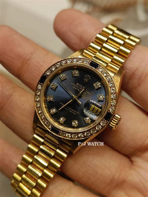 ladies rolex oyster perpetual 69178 blue diamond dial value
